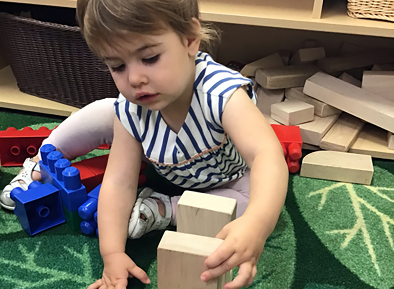 toddler playing in classroom at a Preschool & Childcare Serving Salt Lake City, UT